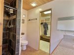 King Bedroom Ensuite Bathroom with Walk-in Closet and Plush Robes